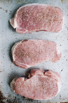 Raw Pork Chops Ready To Go On The Skillet