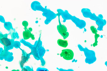 Watercolor and acrylic abstract. Colorful background. Mix, splashes and drawings of colors: blue, green, white background