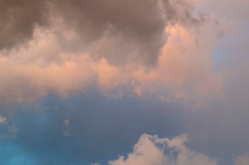 View of dramatic swirling storm clouds in sky at sunset in bonita springs florida.