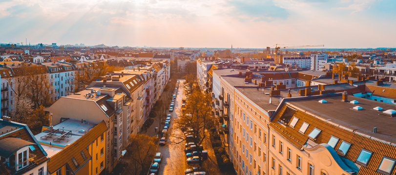 Wide City Street With High-rise Townhouses