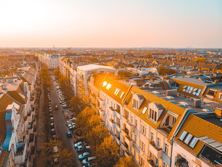 Long city street with residential apartment blocks