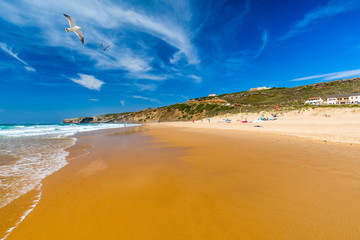 Obraz na płótnie Canvas View of the Monte Clerigo beach on the western coastline of Portugal, Algarve. Stairs to beach Praia Monte Clerigo near Aljezur, Costa Vicentina, Portugal, Europe.