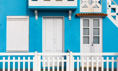Street with colorful houses in Costa Nova, Aveiro, Portugal. Street with striped houses, Costa Nova, Aveiro, Portugal. Facades of colorful houses in Costa Nova, Aveiro, Portugal.