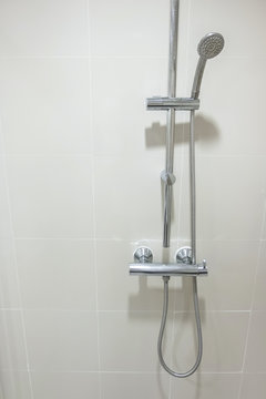 Shower at the bathroom in hospital, safty and medical concept