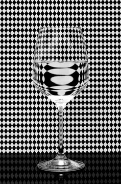 Abstract still life glass against geometric background
