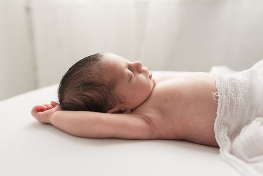 A Tiny Newborn baby Sleeping Quietly