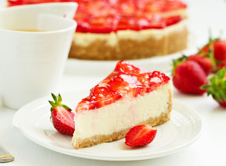 Classic cheesecake with fresh strawberries. Selective focus.