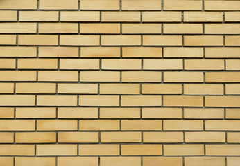 Obraz premium Yellow brick wall background