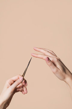 Woman Holding Nail Scissors
