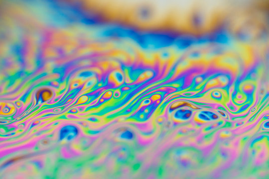Reflections of a soap bubble close up