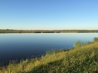 landscape with lake and blue sky