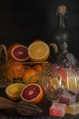 Handmade multi fruit marmalade. On wooden background.