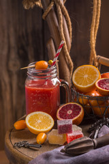 Handmade multi fruit marmalade. On wooden background.