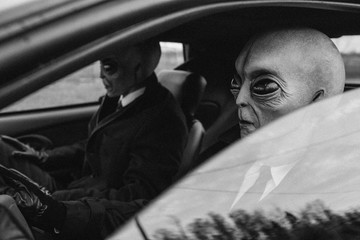 Aliens in car