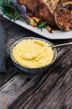 roast pork belly with a side of polenta