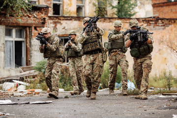 Fototapeta premium Army sniper team during the military operation in the city. war, army, technology and people concept.