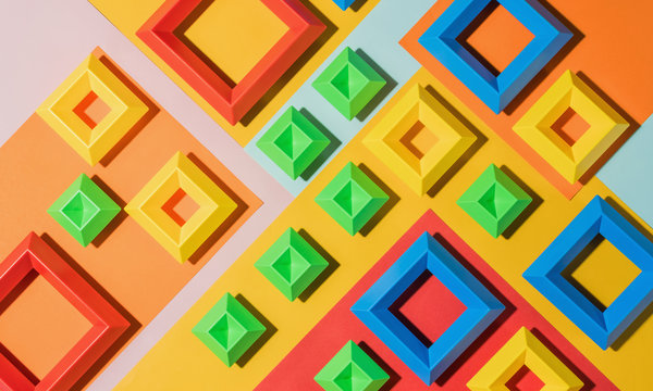 Colorful squares randomly placed on multicolored base