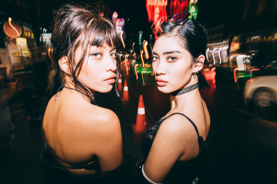 Portrait of  two beautiful asian girl in the city