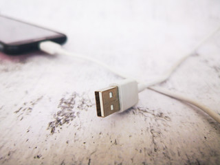 close-up of a usb cable connected to a mobile