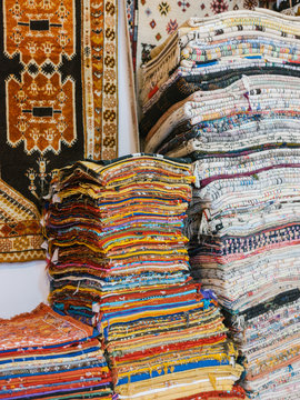 Colorful rugs for sale in shop