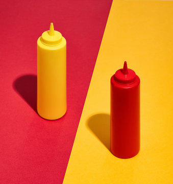 Ketchup And Mustard On Colored Background