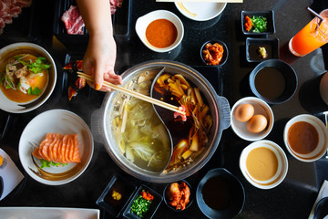 Shabu-Shabu, the tradition Japanese style hotpot which put meat and vegetable boiled in hot soup.