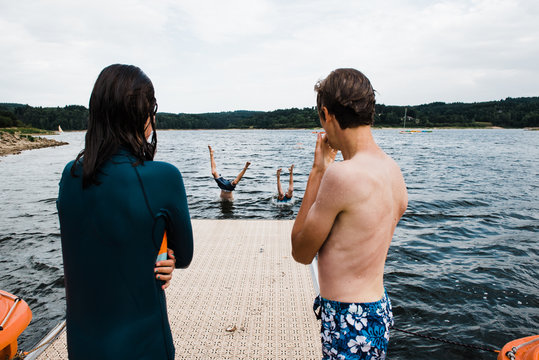 two teens looting  tow other teen diving