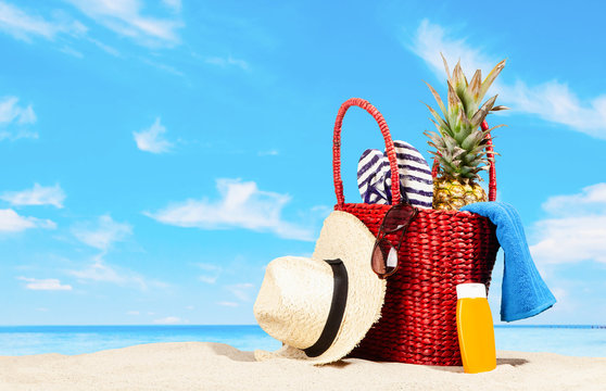 Red beach bag with accessories