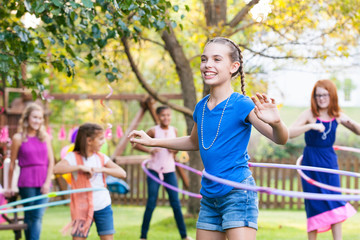 Birthday: Smiling Girl Winning At Hula Hoop Contest