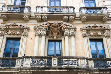 Catania baroque architecture detail of yellow facade in a historic building