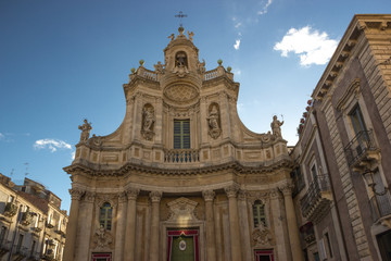 Fototapeta na wymiar Catania baroque Collegiata basilica, architecture of facade and side building
