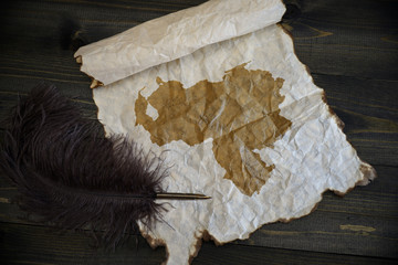 map of venezuela on vintage paper with old pen on the wooden texture desk