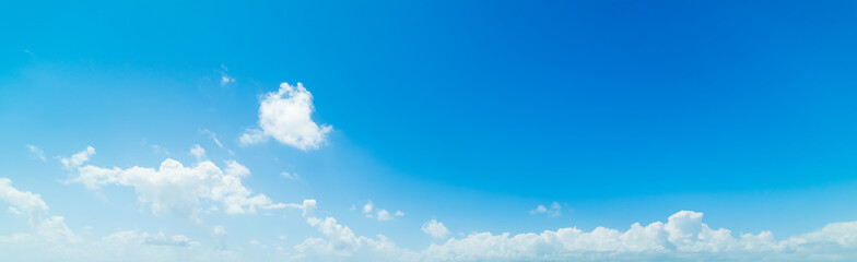 blue sky with white, soft clouds in Springtime