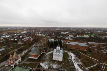 View from the top of Venerable bell tower in Susdal during a moody winter afternoon (Susdal,...