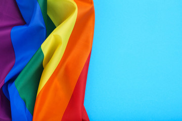 Rainbow flag on blue background