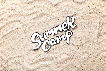 Paper text Summer camp on beach sand