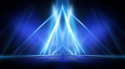 Empty stage, blue neon, abstract blue background. Rays of searchlights, light, abstract tunnel, corridor.