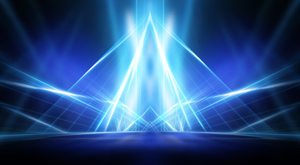 Empty stage, blue neon, abstract blue background. Rays of searchlights, light, abstract tunnel, corridor.