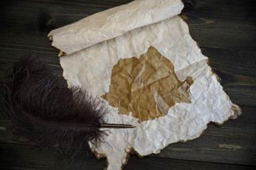 map of romania on vintage paper with old pen on the wooden texture desk