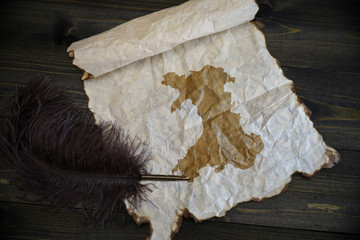 map of wales on vintage paper with old pen on the wooden texture desk