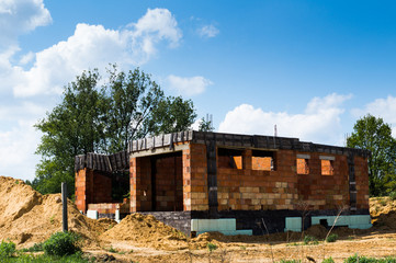 Fototapeta na wymiar Brick house under construction building