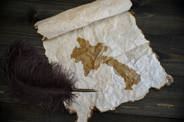 map of laos on vintage paper with old pen on the wooden texture desk