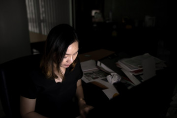 Beautiful asian office woman working overtime at night,Thailand people,Stress people concept,Work ot late