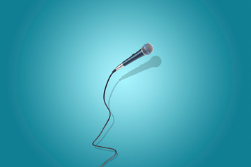 microphone levitating in the air, image over blue background, the concept of accessories for singing