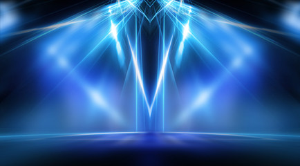 Empty stage, blue neon, abstract blue background. Rays of searchlights, light, abstract tunnel,...
