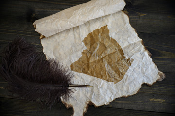 map of algeria on vintage paper with old pen on the wooden texture desk