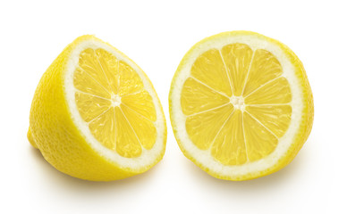 Lemon cut into two halves isolated on white background