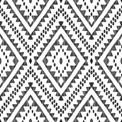 Ikat chevron seamless pattern. Black and white tribal background. Textured vector illustration in modern aztec, navajo, mexican, indian boho style. Usable for fabric, wallpaper, textile.