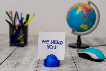 Conceptual hand writing showing We Need You. Concept meaning asking someone to work together for...