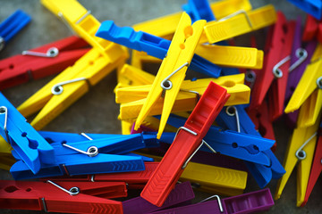 Colorful Plastic Clothespins Scattered